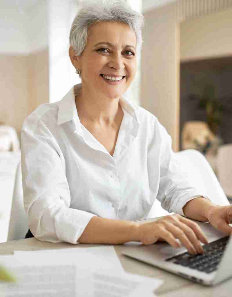 Woman attending summit virtually